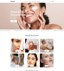 Screenshot einer Schönheits-Webseite: oben ein großes Foto einer lächelnden Frau, die weiße Creme auf Gesicht und Fingern aufträgt, darüber der Slogan 'Awaken Your Natural Beauty' und darunter ein Raster mit Vorschaubildern unter der Überschrift 'Shop By Skin Concern'.