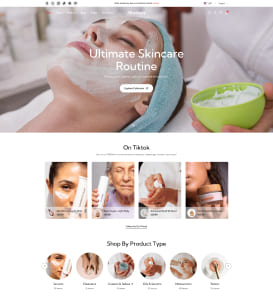 Homepage einer Hautpflege-Website mit großem Hero-Foto einer Person, die im Spa eine weiße Gesichtsmaske erhält, eine Kosmetikerin trägt die Maske mit einem Pinsel auf und hält eine grüne Schüssel mit Creme; darüber der Schriftzug 'Ultimate Skincare Routine', darunter eine TikTok-Produktgalerie und Icons zum Shop-nach-Produkttyp.