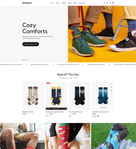 E-Commerce-Startseite für Socken mit großem Hero-Bild zweier Personen in bunten Socken und Sneakers vor gelbem Hintergrund, dem Slogan „Cozy Comforts“ sowie einer "Deal Of The Day"-Produktübersicht und weiteren Lifestyle-Bildern.